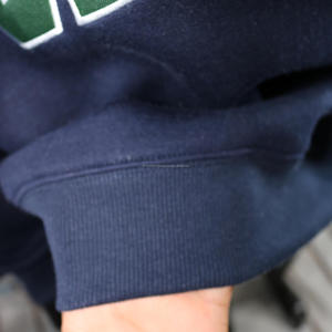 เสื้อสเวตเชิ้ตคอเต่าสีน้ำเงินกรมท่า CASEYS  100%  สีเขียวฮันเตอร์  ปักลาย апплика  เสื้อสเวตเชิ้ตคอกว้าง CLUSH INDUSTRIES - Product Image 4