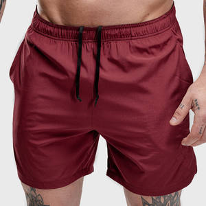 Shorts de sport pour homme, noirs unis, à séchage rapide, avec poches, taille élastique, longueur mi-cuisse, logo sur le devant - Product Image 6