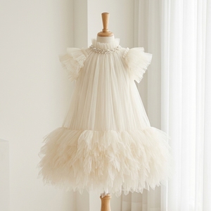 Robe de princesse de luxe sur mesure en tulle plissé ivoire pour filles, avec col en cristal, manches à volants et ourlet à étages, collection boutique pour enfants - Product Image 1
