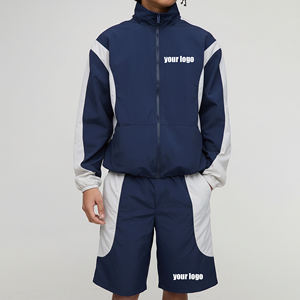 Ensemble survêtement personnalisé imperméable et réfléchissant en polyester et nylon avec veste coupe-vent zippée et short color block - Product Image 1