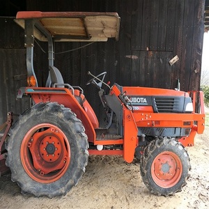 Efficient Kubota L3010 Diesel Tractor 4x4 with Front Loader Offers Superior Power Maneuverability and Durability for All Types - Product Image 1