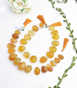 ลูกปัดออนิกซ์สีเหลืองธรรมชาติทรงลูกแพร์ขนาด 8 นิ้ว ลูกปัดออนิกซ์สีเหลืองสำหรับทำเครื่องประดับชั้นดี ลูกปัดพลอยคุณภาพสูง - Product Image 1