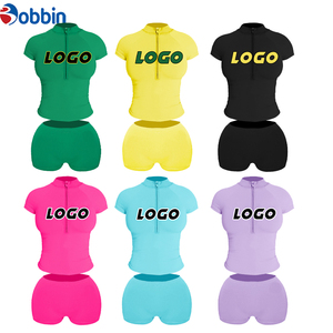 Conjunto de 2 piezas de shorts de verano para mujer, color liso, con logo personalizado, transpirable, de algodón, camiseta con cremallera 1/4, top corto de manga corta, ajuste ceñido. - Product Image 1