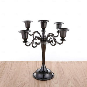 Modern sleek metal candelabra design for home dining <b>table</b> decor with minimalistic <b>matte</b> black finish and durability - Product Image 1