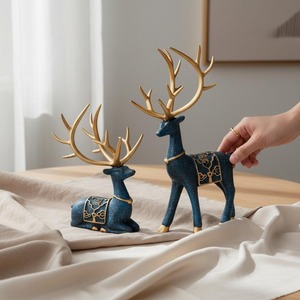 Blue Resin Reindeer Figurines Set of 2 Gold Antlers Contemporary Animal Decor Tabletop Ornament for Living Room <b>Christmas</b> - Product Image 1
