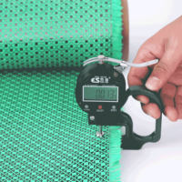Rouleau de tissu en fibre de carbone jacquard vert noir 3K 240GSM pour panneaux composites décoratifs et garnitures intérieures automobiles