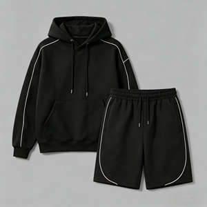Ensemble survêtement décontracté pour homme, coupe oversize, avec short et sweat à capuche, noir avec passepoil blanc contrastant, style streetwear vintage délavé - Product Image 1