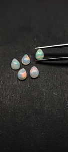 Ópalos Blancos Naturales Etíopes de Alta Luminosidad, Forma de Pera Lisa, Cabujones de 7*9 mm, Oferta al por Mayor a Precio de Mayoreo, Compre Joyería en Línea - Product Image 4
