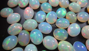 โอปอลไฟสีขาวเอธิโอเปีย เวลโล คุณภาพสูงสุด 3 กะรัต รูปไข่ ทรงคาโบชอง พลอยธรรมชาติ ขนาดเฉลี่ย ขั้นต่ำสั่งซื้อ 100 กะรัต - Product Image 3