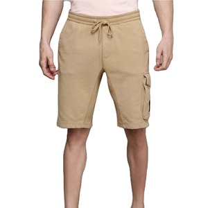 Shorts en toile tricotée respirants et de haute qualité pour l'été, séchage rapide, en polyester et coton, personnalisables, prix abordable, vente en gros - Product Image 1
