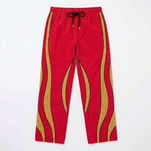 Pantalones Deportivos Rojos con Detalles en Mostaza, Venta al Por Mayor |   Pantalones deportivos casuales de mezcla de algodón |   Proveedor de Ropa Urbana y Boutique OEM - Product Image 1