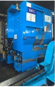 Máquina CNC Fanuc de doble torreta vertical usada para reparación de llantas de aleación de servicio ligero con doble husillo - Product Image 3