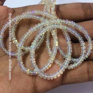 Cuentas de ópalo etíope natural de 3 mm, lisas, en forma de rondel, de proveedor mayorista, al mejor precio, calidad semipreciosa AAA. - Product Image 1