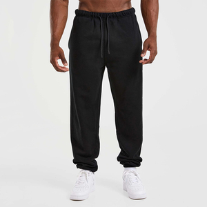 Nouveau pantalon de jogging décontracté pour homme en coton noir, avec logo personnalisé, taille élastique et cordon de serrage, en tissu tricoté, à prix bas - Product Image 1