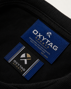 ป้ายผ้าปักลาย Oxytag Sports รูปทรงสี่เหลี่ยมผืนผ้า สำหรับติดเสื้อผ้า ตัดขอบด้วยเลเซอร์ ราคาขายส่ง รับผลิตตามแบบ OEM ป้ายปี 2026 - Product Image 4