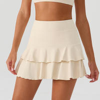 Jupe de tennis premium pour femme à double volant, respirante et à séchage rapide, idéale pour l'entraînement de badminton