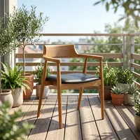 Chaise de restaurant moderne en velours et bois avec dossier incurvé, accoudoirs, siège rembourré noir et pieds en métal pour hôtel et salon