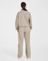 Ensemble de survêtement rétro pour femme avec logo personnalisé, veste et pantalon de jogging légers à passepoil contrastant, vente en gros