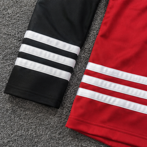เสื้อฮอกกี้น้ำแข็งแบบซับลิเมชั่นสำหรับผู้ชาย แขนยาว คอวี ผูกเชือก สีแดงดำลายทาง ผ้าโพลีเอสเตอร์ซับเหงื่อ - Product Image 3