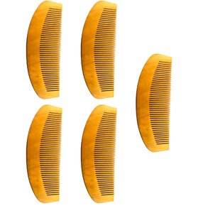 Set of five curved <b>wooden</b> <b>combs</b> with fine teeth, offering smooth hair grooming everyday, available at wholesale prices. - Product Image 1