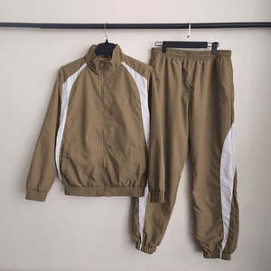 Oferta Caliente: Conjunto Cortavientos Personalizado de Alta Calidad para Mujer - Chaqueta con Cremallera y Pantalón Jogger a Rayas - Product Image 2