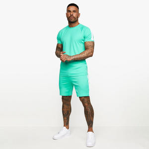 Ensemble polo et short homme été, couleur unie, impression sérigraphique personnalisée OEM, logo frontal, manches courtes, col rond. - Product Image 1
