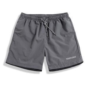 Shorts de bain pour hommes 100% haute qualité, couleur unie, pour l'été et la plage, avec logo personnalisé, vente en gros, décontractés, en toile tissée, coupe-vent, séchage rapide - Product Image 1