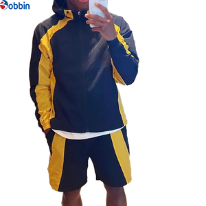 Conjunto Deportivo de Chaqueta con Cierre y Parches Reflectantes con Logotipo Personalizado y Pantalones Cortos de Nailon, Unisex, Cortavientos para Hombre - Product Image 3