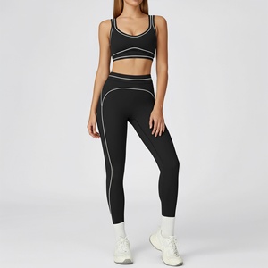 ชุดโยคะผู้หญิงดีไซน์ใหม่ปี 2026 แบบมืออาชีพ แห้งเร็ว เป็นมิตรกับสิ่งแวดล้อม 2 ชิ้น ผ้าสแปนเด็กซ์/ไนลอน คอกลม แขนกุด ยืดหยุ่นได้ - Product Image 1