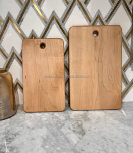 Planche à découper à motif géométrique en bois avec poignée pour intérieur de cuisine - Product Image 1