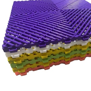 Dalles de sol en plastique écologiques pour garage automobile - Product Image 1