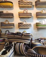 Panier à langer pour bébé en herbe de mer naturelle en gros du Vietnam avec poignées en corde, panier de Moïse avec coussin pour bébé, panier en herbe de mer pour bébé