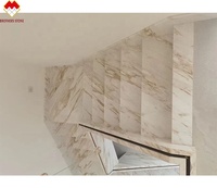 Taille personnalisée Venus Gold Calacatta Marbre Escalier en colimaçon antidérapant Intérieur Moderne Lumière LED Pierre Naturelle Étoiles de Travail