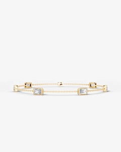 Bracelet pour femme AURA LUXURIA, diamant de laboratoire de 3 carats, taille radiant allongée, clarté VVS, or jaune 14 carats, 6 pierres latérales serties clos - Product Image 1