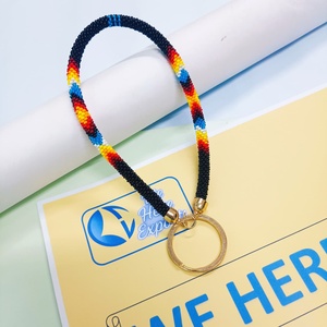 WE HERE EXPORTS Porte-clés de poignet tendance pour femme, fait main, avec perles de rocaille, pierres imitation perle et éléments à insérer pour ongles, cadeau bleu - Product Image 1