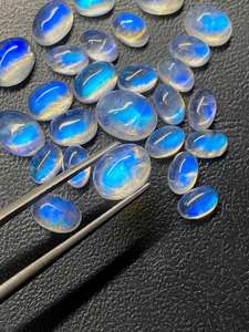 มูนสโตนสีขาวรุ้งรูปไข่แบบคาโบชอง  พร้อมแสงสีฟ้า  ขนาด 6x4 มม. ถึง 10x14 มม. สำหรับทำเครื่องประดับ - Product Image 2