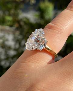 3 Carat Oval Cut <b>Diamond</b> with Two Tapered Baguette Side Stones Knife Edge Basket Set Engagement <b>Ring</b>, IGI Certified - Product Image 2