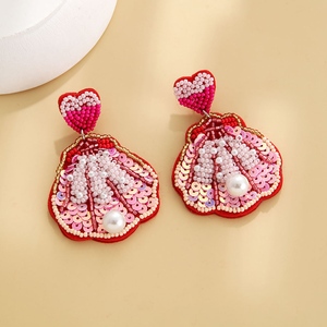 Boucles d'oreilles pendantes style bohème pour femme, avec perles de verre, motifs fleur, flamant rose, cactus et graines, design tendance par MULTI CRAFT - Product Image 3