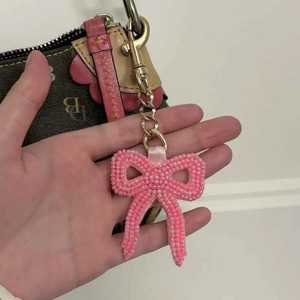 Pink Beaded <b>Bow</b> Classic Circle Pattern Canvas Woven Keychain Charm Cute Style Accessory - Product Image 1
