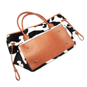 Bolso de mano de piel de vaca marrón de ante personalizable para mujer, 100 unidades, venta al por mayor, bolso de fin de semana grande negro y blanco de piel de vaca, bolso de moda de piel corta con diseño animal - Product Image 2