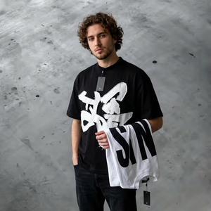 T-shirt unisexe oversize noir 100 % coton streetwear avec imprimé lettres blanches, manches courtes, col rond, séchage rapide, respirant, coupe jersey - Product Image 1