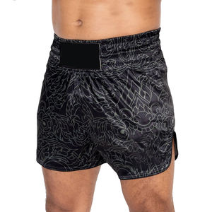 Pantalones Cortos de Muay Thai Unisex Personalizados, Ligeros, Elásticos, de Poliéster y Algodón, Transpirables, con Logotipo Frontal, para Entrenamiento, Gimnasio y Deportes - Product Image 1