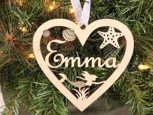 Minimalist Handmade Wooden Hanging Ornament with Modern Holiday Style and Warmth - Product Image 1