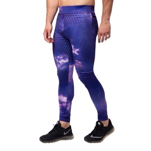Leggings de sport pour hommes, coupe slim, taille élastique, couleur unie, pantalon de compression de haute qualité, imprimé uni - Product Image 1