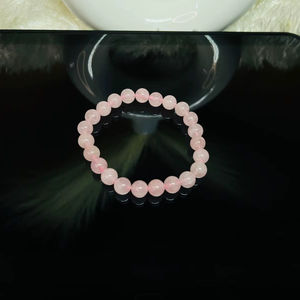 Bracelet élastique fait main en perles de cristal de quartz rose rondes de 8 mm du Gujarat - Protection spirituelle et croissance des qualités semi-précieuses - Product Image 6