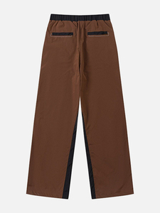 Pantalones deportivos cortavientos para hombre de secado rápido, hechos con tela ligera para un estilo de vida activo y rendimiento al aire libre. - Product Image 2