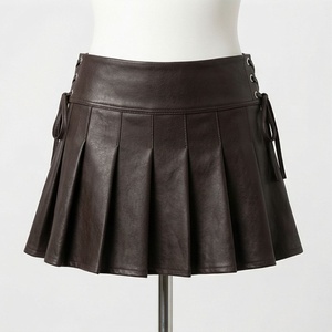 Jupe mini plissée en similicuir taille haute pour femme, avec lacets latéraux ajustables, couleur unie, style toutes saisons - Product Image 1