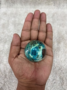Esfera de crisocola shattuckita con tonos minerales azul verdoso vivos, patrones de matriz intrincados, pulida, redondeada y distintiva - Product Image 1