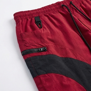 Pantalones Jogger Rojos y Negros al por Mayor, Pantalones Cortavientos de Nailon con Cremalleras Utilitarias, Proveedor OEM de Ropa Urbana y Deportiva - Product Image 4