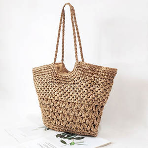 Experience effortless elegance with this stunning Natural yarn bag featuring a carved <b>top</b> line and a patterned bottom accent - Product Image 4